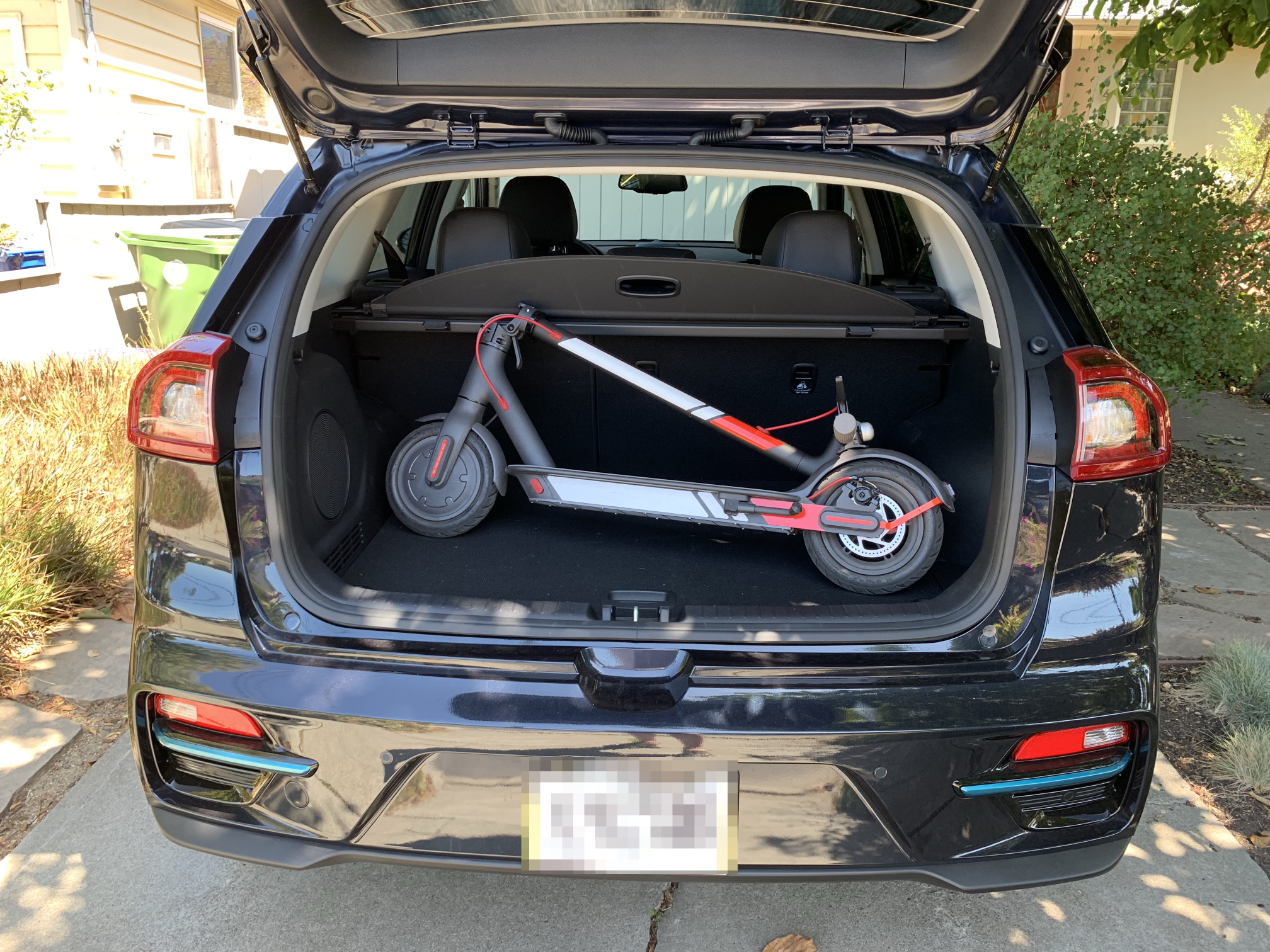 electric-scooter-in-electric-car