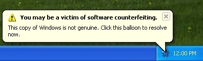 You may be a victim of software counterfeiting. This copy of Windows is not genuine. Click this balloon to resolve now.