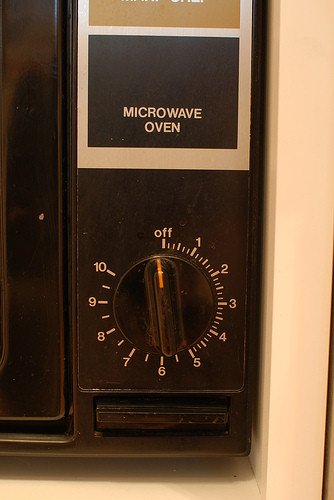 Controls on an older microwave